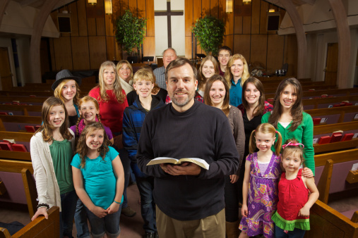 smiling church congregation enjoying more members with SEO
